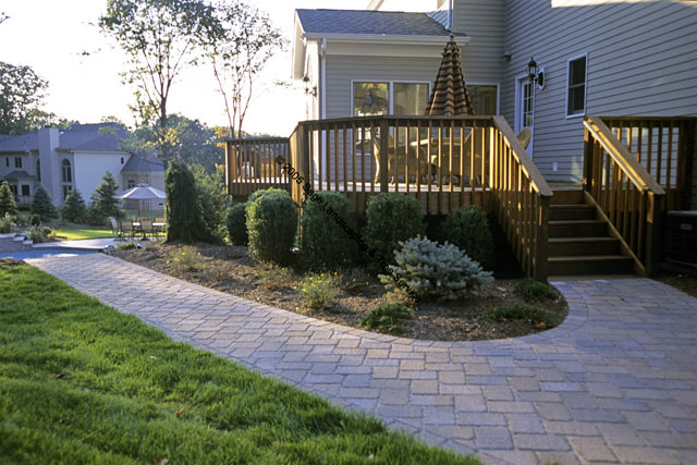 photo of stone walk leading to raised deck