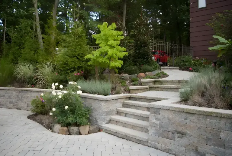 Stone Retaining Wall with Steps Installation - Sage Landscape Contractors