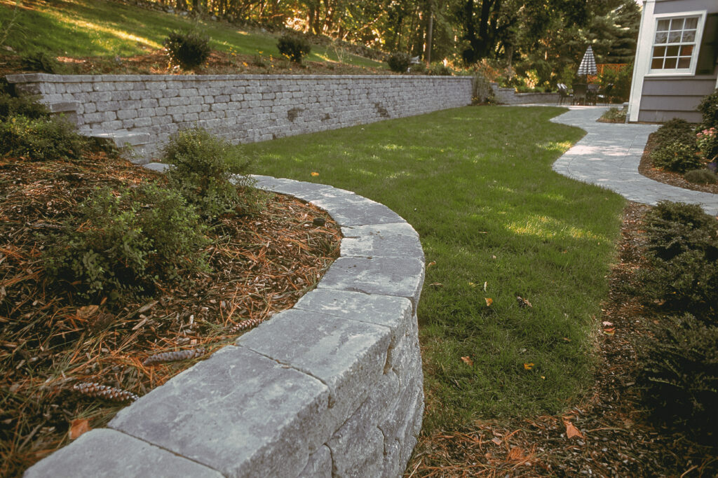 Retaining Wall Ideas for a Sloped Backyard: Practical Solutions With Lasting Style: Sage Landscape Contractors & Tree Experts